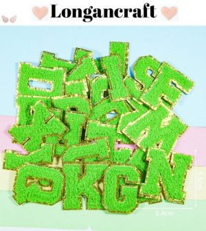 A set of Green Chenille Iron On Letters with Golden Edge