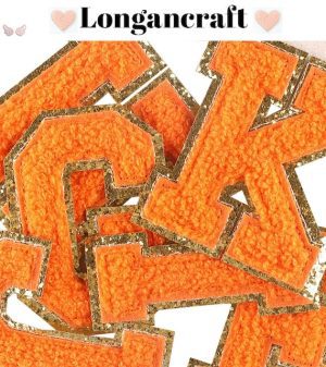 A set of Orange Chenille Iron On Letters
